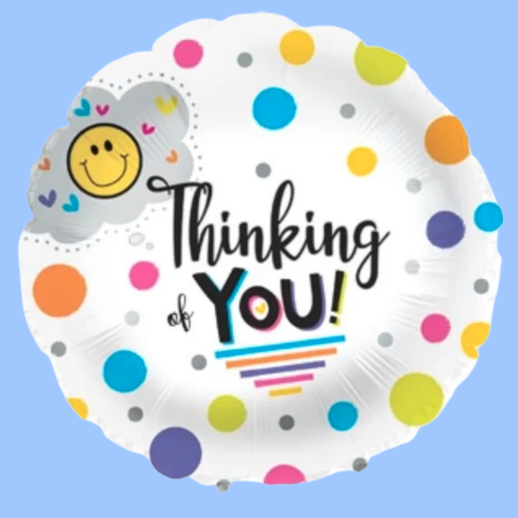 A round white foil balloon with colorful polka dots and the text 'Thinking of YOU!' in black script, plus a smiling face cloud graphic, shown on a light blue background.