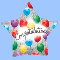 A star-shaped foil balloon with a silver reflective background, decorated with colorful balloons in red, blue, green, yellow, and purple, and featuring the word 'Congratulations' in black script across the center, shown against a solid light blue background.