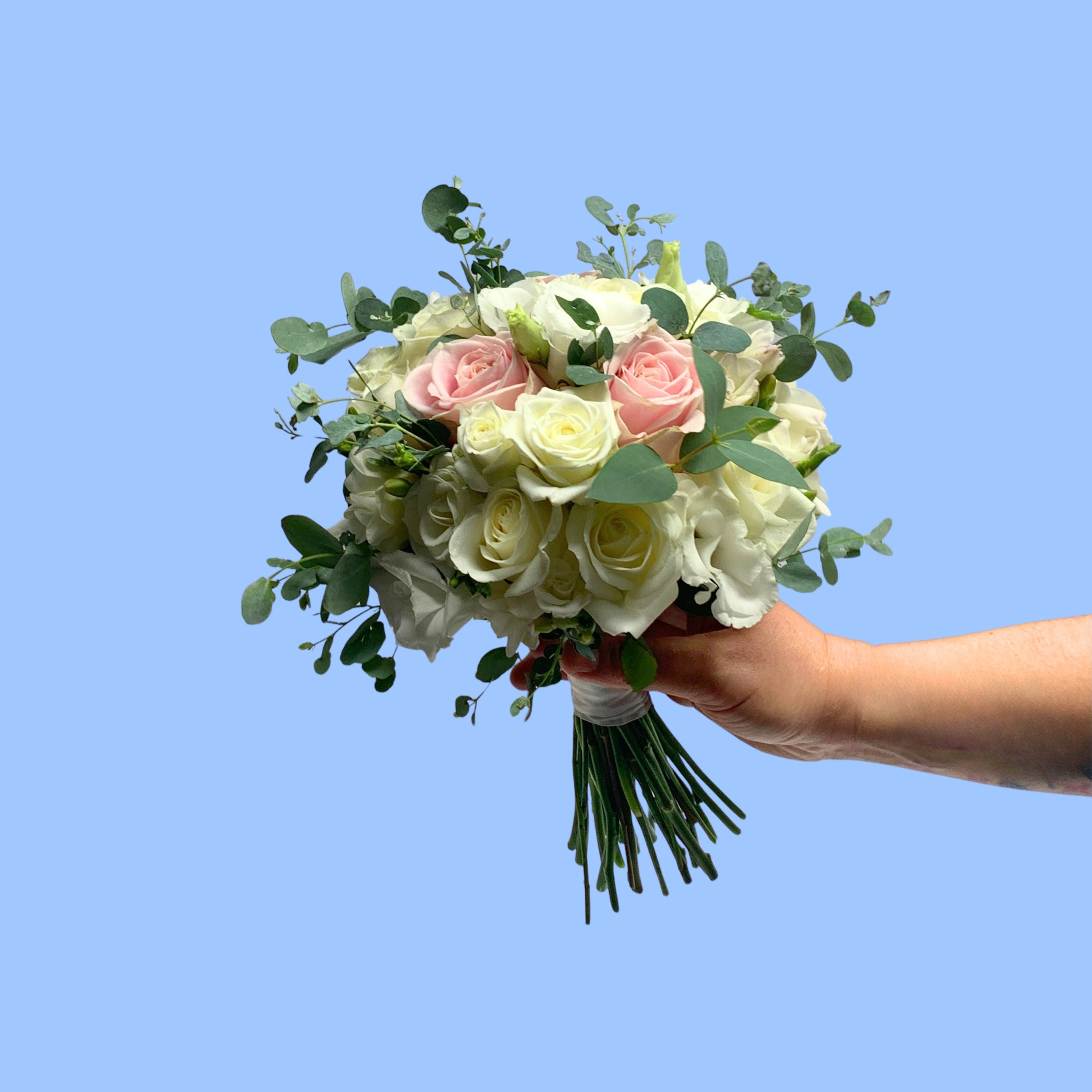 Round Bohemian style bridal bouquet with roses and blue gum
