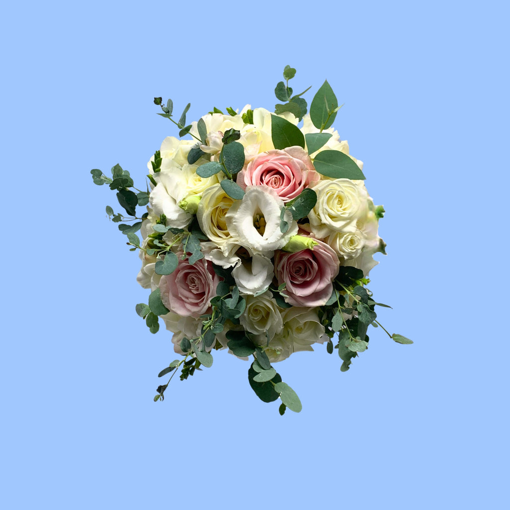 top view of Round Bohemian style bridal bouquet with roses and blue gum