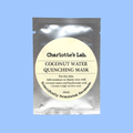 Charlotte's Lab Coconut Water Quenching Mask in a silver pouch with a large cream-colored circular label, set against a solid light blue background.
