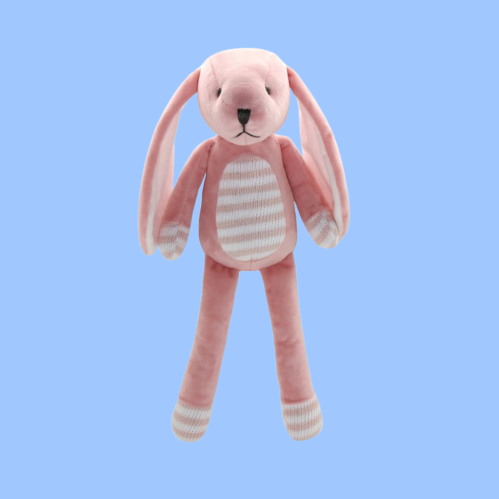 A pink plush bunny toy with long floppy ears, a white striped belly panel, and white striped paws and feet, shown against a solid light blue background.