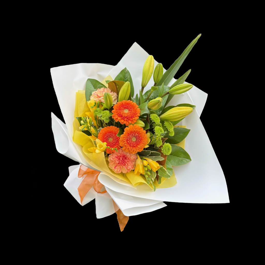 Orange and yellow flower bouquet with green foliage, wrapped in white with yellow vilene and orange bow