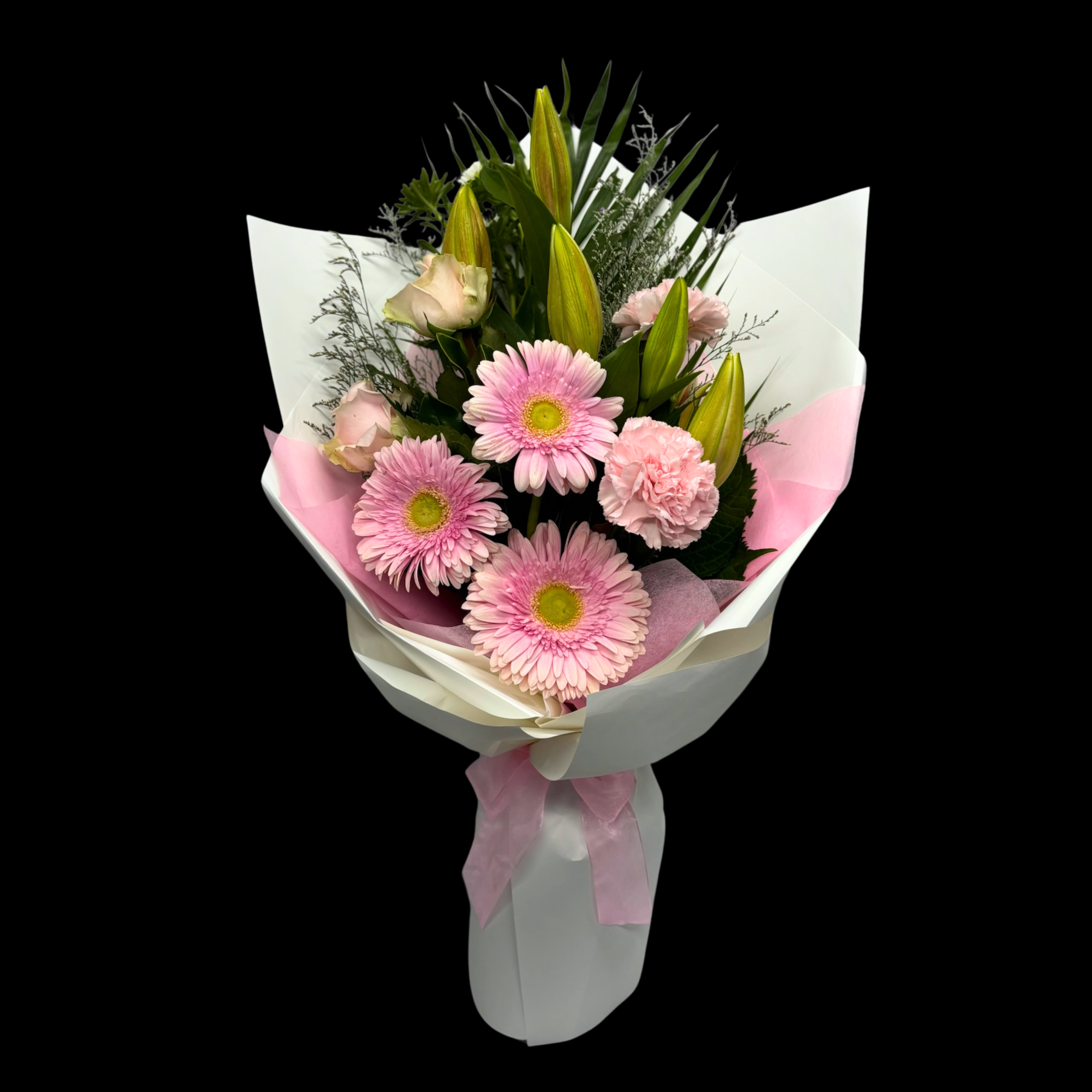 Soft Pink flower bouquet wrapped in white with pink vilene and bow.