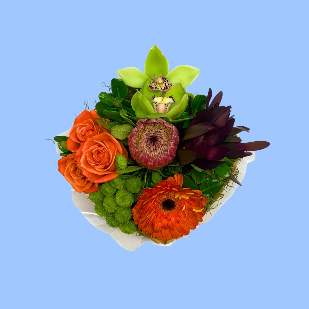 Top view of flower tropical flower arrangement in basket