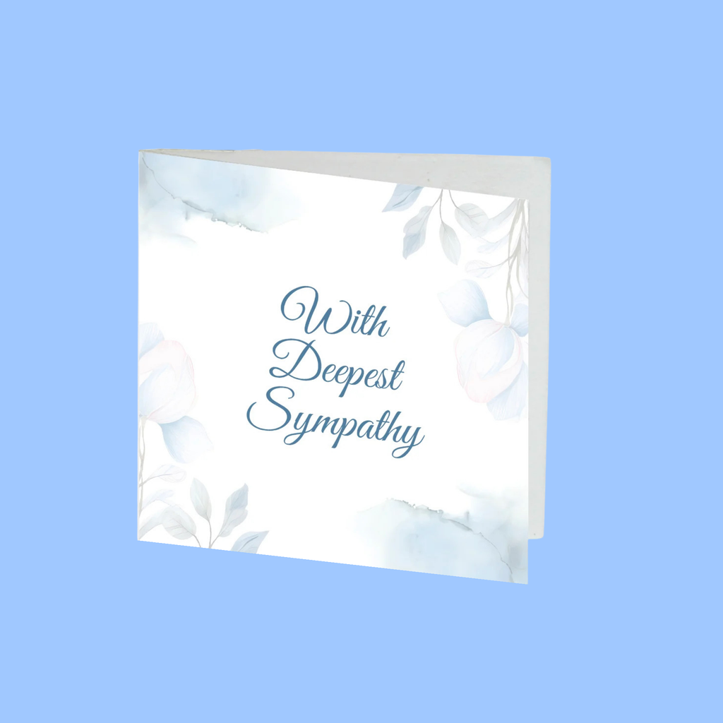 A folded sympathy greeting card with a white background, soft blue watercolor floral accents, and the text 'With Deepest Sympathy' in blue script, shown on a light blue background.